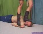 Miss July's cowgirl boot trample