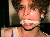 LATINA MARIA IS BALL-GAGGED, HANDCUFFED, HANDGAGGED, PANTY STUFFED & CLEAVE & OTM GAGGED WITH ACE BANDAGE (D34-14)