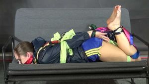 Rachel Adams Scarfbound and gagged in shiny Shorts