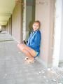Leonie wearing a sexy shiny nylon shorts and a rain jacket posing for the camera (Pics)