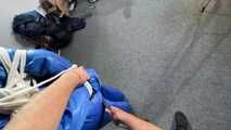 Myxxxy bound and gagged in a shiny nylon Skisuit