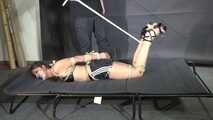 Marie hogtied and tapegagged in shiny nylon Shorts