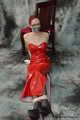 Bound in red PVC dress