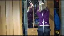 Pia tied with ropes overhead and gagged with a ballgag wearing sexy rain pants and a rain jacket (Video)