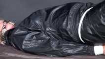 Watching Pia being tied and gagged with ropes and a clothgag wearing sex black shiny nylon suit (Video)