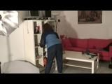 Archive girl chilling in her flat wearing sexy shiny nylon rainwear (Video)