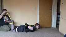 Hogtied in yellow ropes