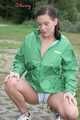Watching ***OUR SEXY ARCHIVE MODEL JENNY*** wearing a sexy white shiny nylon shorts and a green shiny nylon rain jacket posing for you (Pics)