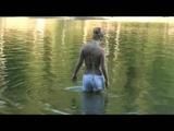 Jenny swimming in the sea wearing sexy shiny nylon shorts and a bikini top (Video)