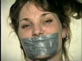 26 Yr OLD BARMAID IS BOUND, MOUTH STUFFED, HANDGAGGED & TAPE GAGGED (D27-2)
