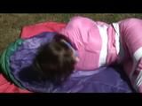 03:50 Min. video with Julia tied and gagged in a shiny pink skisuit