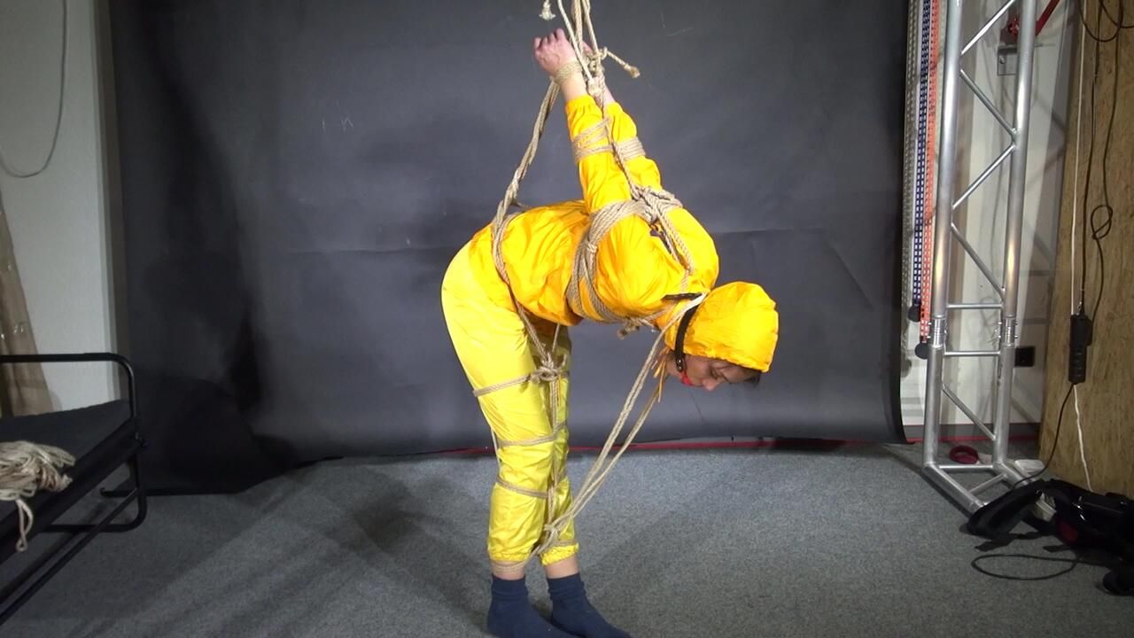 Marie Tied And Gagged In Shiny Nylon Rainwear