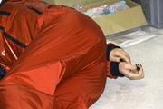 Shelly tied and gagged in shiny nylon rainwear