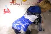 Sonja wearing a super sexy shiny nylon rain jacket and rain pants while taking a foam bath (Pics)
