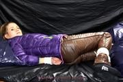 Samantha tied and gagged in shiny nylon downwear