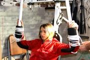 Katharina tied and gagged in shiny nylon rainwear