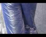 Get an Archive Video with Mara enjoying a shower with her shiny nylon downjacket