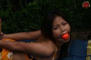 Asian Girl Handcuffed Incomfortably
