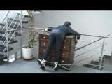 03:00 Min. video with Shelly tied and gagged in shiny nylon rainwear