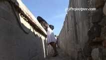 016237 Eve Pees On The Castillo Battlements