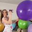 sexy teasing and popping balloons with fingernails and wooden stick and topless